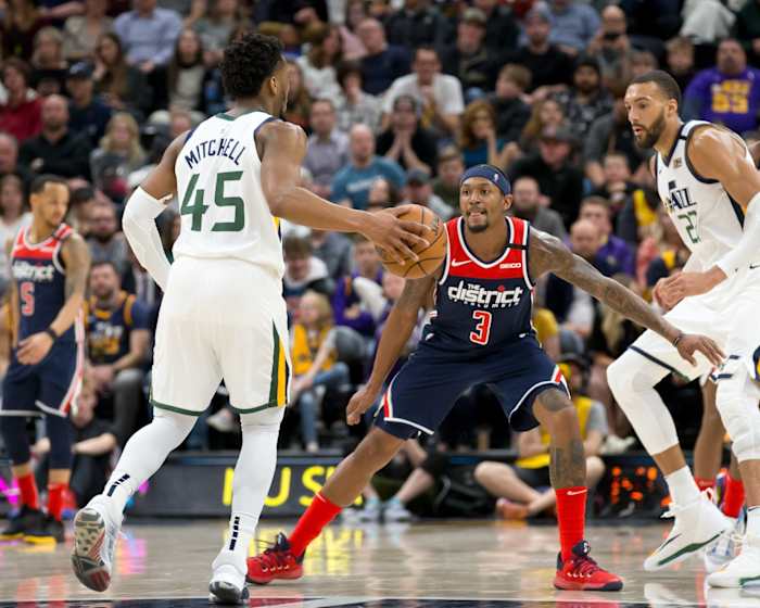 Donovan Mitchell (45) goes head to head with Bradley Beal (3) 